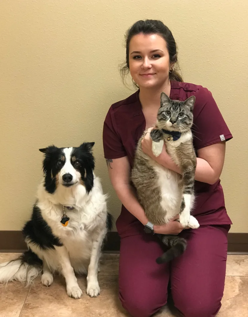 Jessica at Dunes Animal Hospital, with dog and cat